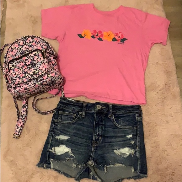 Pink O’Neil shirt, American Eagle shorts, backpack